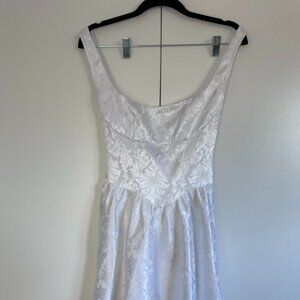 Lucy in the Sky jacquared white backless bow dress